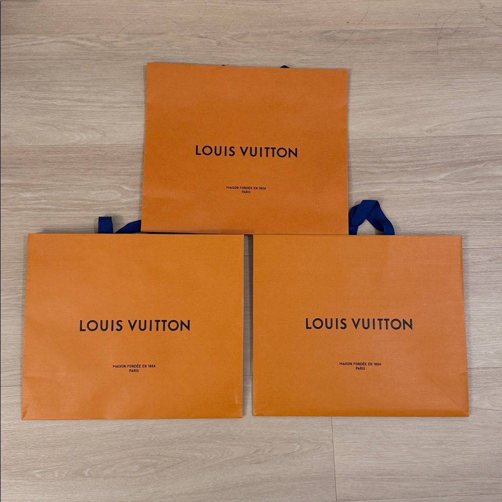 Louis Vuitton Bold Orange Bags with Blue Handles